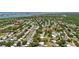 Wide aerial view showing property location, proximity to water, and neighborhood at 12453 138Th N St, Largo, FL 33774
