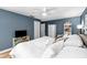 Bright bedroom showcasing a cozy bed, white linens, and ample storage space at 12453 138Th N St, Largo, FL 33774