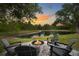 Enjoy the firepit and lakeside views at 14019 Nighthawk Ter, Lakewood Ranch, FL 34202