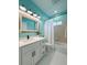 Bright bathroom with a vanity, tub/shower combo, and modern fixtures at 14019 Nighthawk Ter, Lakewood Ranch, FL 34202