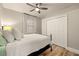 Bedroom with neutral decor, closet, and wood floors at 14019 Nighthawk Ter, Lakewood Ranch, FL 34202