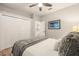 Bedroom featuring a closet, light gray walls, hardwood floors, and a ceiling fan at 14019 Nighthawk Ter, Lakewood Ranch, FL 34202