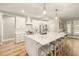 Modern kitchen with a large island, stainless steel appliances, and ample cabinet space at 14019 Nighthawk Ter, Lakewood Ranch, FL 34202