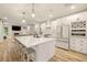 Spacious kitchen with an island, stainless steel appliances and bar stool seating at 14019 Nighthawk Ter, Lakewood Ranch, FL 34202