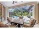 Covered patio with comfortable seating and views of the pool at 14019 Nighthawk Ter, Lakewood Ranch, FL 34202