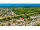 Charming neighborhood featuring single-Gathering homes with lush greenery and close proximity to the water at 1408 Dartmouth Dr, Holiday, FL 34691