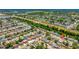 Charming neighborhood featuring single-Gathering homes with lush greenery and close proximity to the water at 1408 Dartmouth Dr, Holiday, FL 34691
