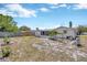 Large backyard with ample space for gardening, recreation, and outdoor enjoyment at 1408 Dartmouth Dr, Holiday, FL 34691