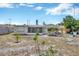 Spacious backyard with a screened-in porch, perfect for outdoor activities and relaxation in a private setting at 1408 Dartmouth Dr, Holiday, FL 34691