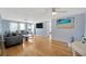 Spacious living room with an open layout featuring hardwood floors at 1408 Dartmouth Dr, Holiday, FL 34691