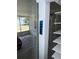 Close-up of sliding glass door highlighting the impact-resistant glass in the screened porch at 1408 Dartmouth Dr, Holiday, FL 34691