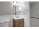 Bathroom features a vanity with a sink and toilet at 1516 Roundtree Rd, Holiday, FL 34690