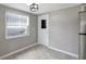 Cozy dining area with tile flooring, and backyard access at 1516 Roundtree Rd, Holiday, FL 34690