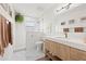 Modern bathroom featuring a walk-in shower, updated vanity, and stylish fixtures, blending functionality and elegance at 1529 79Th N Ave, St Petersburg, FL 33702