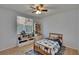 bedroom with ceiling fan, carpet and ample space for storage and play at 15724 Ibisridge Dr, Lithia, FL 33547