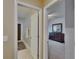 View of doorway between the Primary bath and bedroom at 15724 Ibisridge Dr, Lithia, FL 33547