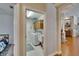 Laundry room with washer, dryer, utility sink, and cabinets, situated off the hallway at 15724 Ibisridge Dr, Lithia, FL 33547