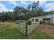 Fenced backyard with equestrian facilities and access to barn at 1641 Thompson Rd, Lithia, FL 33547