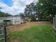 Exterior shot showcasing large oak trees at 1641 Thompson Rd, Lithia, FL 33547