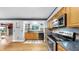 Galley kitchen with updated appliances and a breakfast nook at 1641 Thompson Rd, Lithia, FL 33547