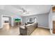 Open-concept living room with tile flooring and a large window at 1641 Thompson Rd, Lithia, FL 33547
