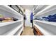 Large walk-in closet with custom shelves, providing ample storage space at 1641 Thompson Rd, Lithia, FL 33547