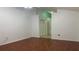 Bedroom featuring wood-look floors and neutral walls at 16505 Lake Heather Dr, Tampa, FL 33618