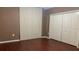 Bedroom with laminate flooring and large closet space at 16505 Lake Heather Dr, Tampa, FL 33618