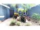 Close up of a home's front entrance with mature landscaping at 16505 Lake Heather Dr, Tampa, FL 33618