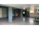 Spacious living area with tile floors, columns, and multiple entry doors at 16505 Lake Heather Dr, Tampa, FL 33618