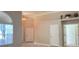 Inviting living space with natural light and doorway into adjacent room at 16505 Lake Heather Dr, Tampa, FL 33618