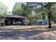 The property showcases a versatile shed near an above-ground pool for recreational enjoyment at 16536 Caldwell Ln, Spring Hill, FL 34610