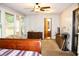Spacious bedroom with large windows, allowing for plenty of natural light, and classic furnishings at 16536 Caldwell Ln, Spring Hill, FL 34610
