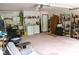 Spacious garage equipped with laundry area and storage solutions, providing functionality and organization at 16536 Caldwell Ln, Spring Hill, FL 34610