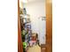 Pantry with stocked shelving and water heater at 16536 Caldwell Ln, Spring Hill, FL 34610