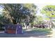 Land view with multiple sheds and garages at 16536 Caldwell Ln, Spring Hill, FL 34610