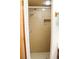 Walk-in shower features neutral-toned tile and built-in niche, providing a clean and relaxing bathing experience at 16536 Caldwell Ln, Spring Hill, FL 34610