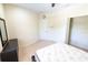 Bedroom featuring a double door closet, dresser, soft carpet flooring, and warm-toned wall paint at 16637 Ashton Green Dr, Lutz, FL 33558
