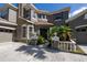 Elegant home with stone accents, a two-car garage, and a meticulously maintained lawn at 16637 Ashton Green Dr, Lutz, FL 33558