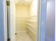 Walk-in pantry features adjustable wire shelving at 16637 Ashton Green Dr, Lutz, FL 33558
