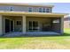 Covered patio with ample space for outdoor seating and entertaining at 16637 Ashton Green Dr, Lutz, FL 33558