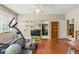Functional bonus room equipped with exercise equipment and entertainment area at 1750 Arabian Ln, Palm Harbor, FL 34685