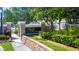 Eagles Reserve entrance sign featuring lush landscaping and well-maintained community grounds at 1750 Arabian Ln, Palm Harbor, FL 34685