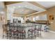 Spacious kitchen with a large island, granite countertops, stainless steel appliances, and ample cabinet space at 1750 Arabian Ln, Palm Harbor, FL 34685