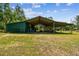 A large pole barn on the property at 19708 Bower Rd, Dade City, FL 33523