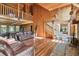 Expansive living room showcasing high ceilings, wooden accents, and an open layout perfect for gathering and relaxation at 19708 Bower Rd, Dade City, FL 33523