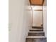 Stairway leading down to an unknown area with wood steps at 19708 Bower Rd, Dade City, FL 33523