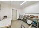 Clean, versatile storage room with ample shelving and potential for various uses at 19708 Bower Rd, Dade City, FL 33523