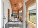 A sun room with wood floors, wood walls and wood ceiling at 19708 Bower Rd, Dade City, FL 33523