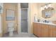 Bright bathroom featuring a glass shower, neutral walls, and modern vanity with a vessel sink at 2228 Swedish Dr # 22, Clearwater, FL 33763